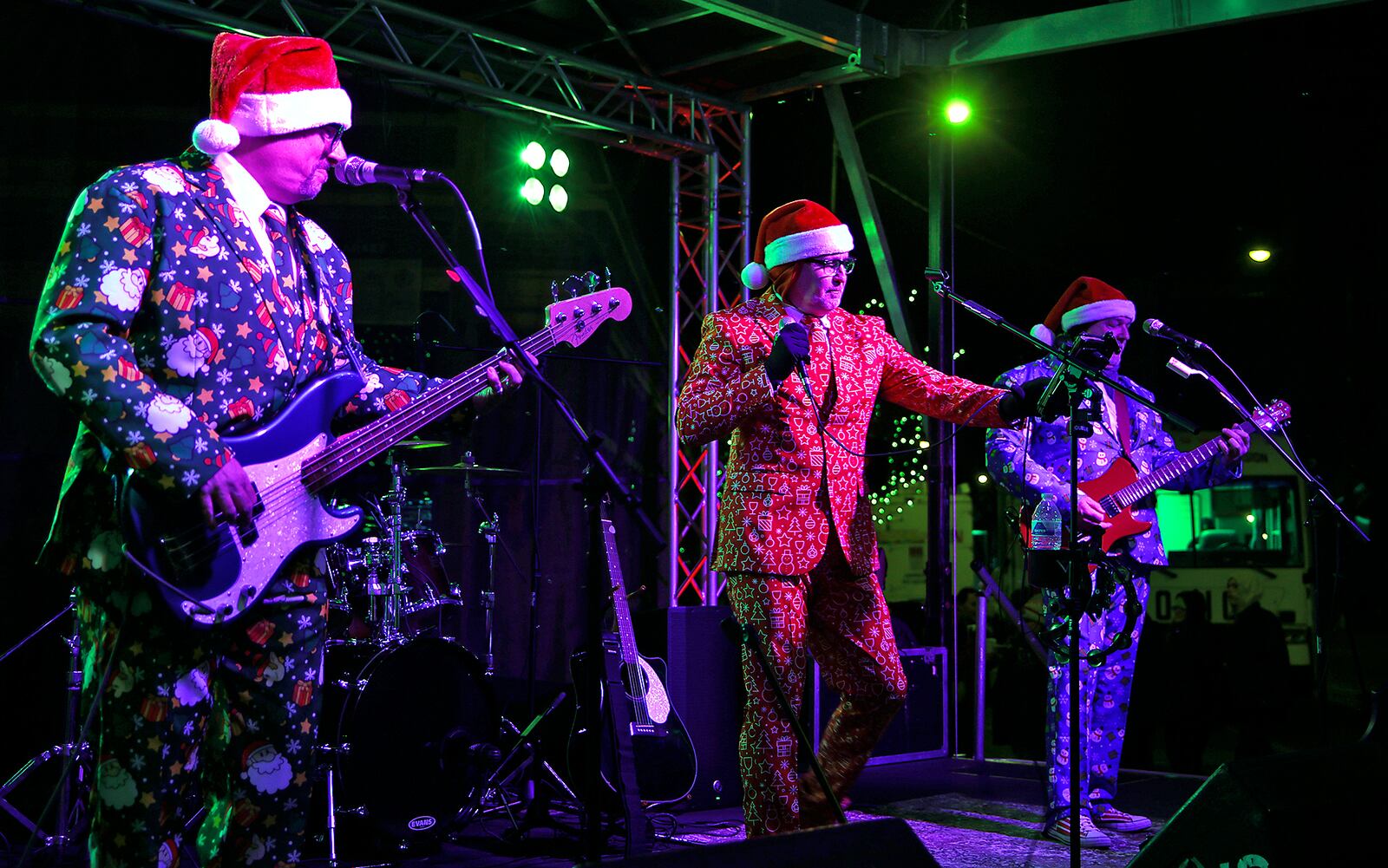 The Temps perform on stage in the middle of High Street Friday, Nov. 24, 2023 during the Holiday in the City Grand Illumination. BILL LACKEY/STAFF