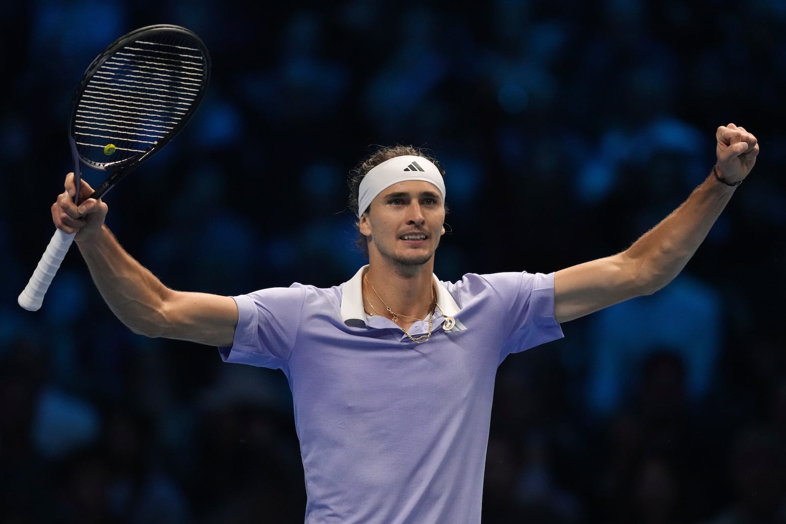 Germany's Alexander Zverev celebrates after winning the set point during the singles tennis match of the ATP World Tour Finals against Spain's Carlos Alcaraz, at the Inalpi Arena, in Turin, Italy, Friday, Nov. 15, 2024. (AP Photo/Antonio Calanni)