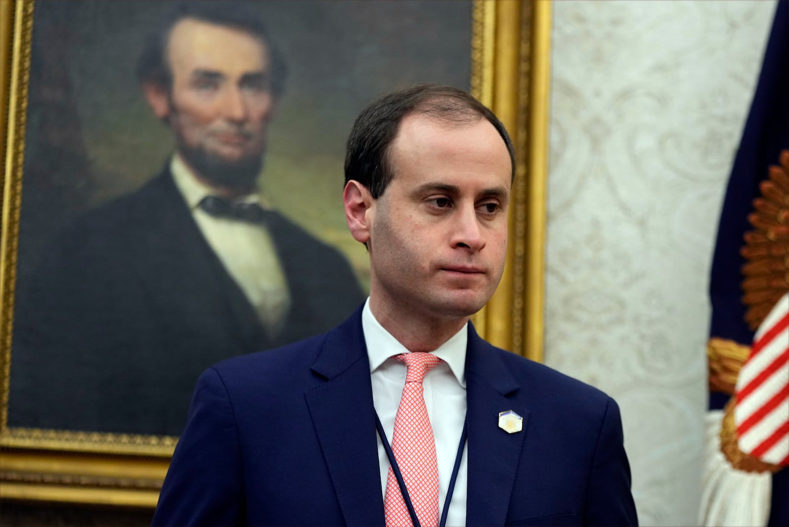 White House staff secretary Will Scharf watches as President Donald Trump signs executive orders in the Oval Office of the White House, Thursday, Jan. 23, 2025, in Washington. (AP Photo/Ben Curtis)