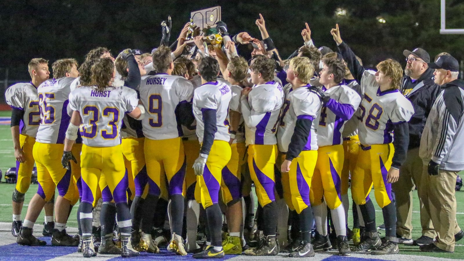 The Mechanicsburg High School football team raises the D-VI Region 24 championship trophy after beating Covington 42-26 on Friday night at Piqua’s Alexander Stadium. The Indians advanced to the D-VI state semifinals for the first time since 2013. CONTRIBUTED BY MICHAEL COOPER