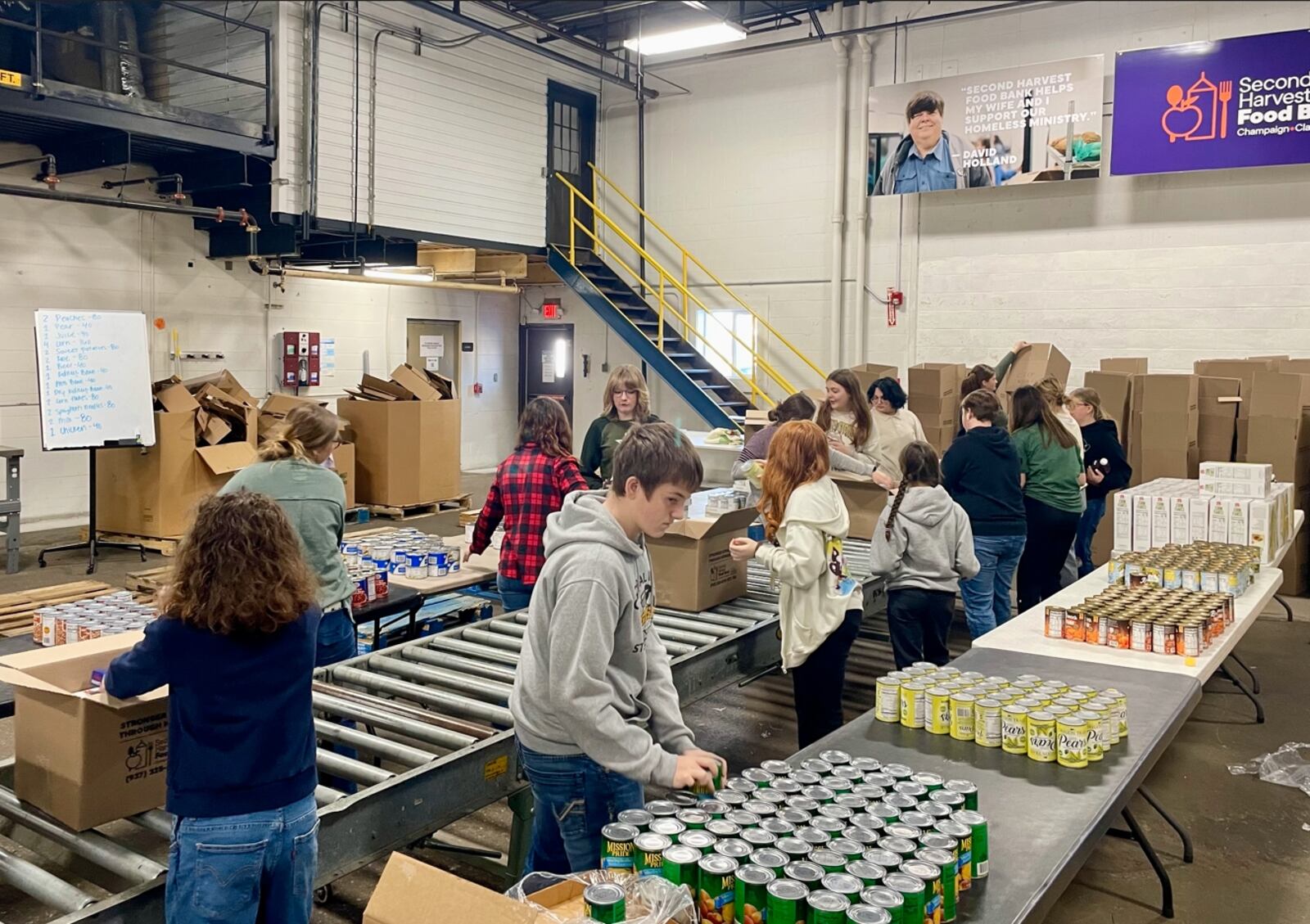 Global Impact STEM Academy FFA members volunteered at the Second Harvest Food Bank as part of FFA week where 23 students packed 200 boxes of food. Contributed