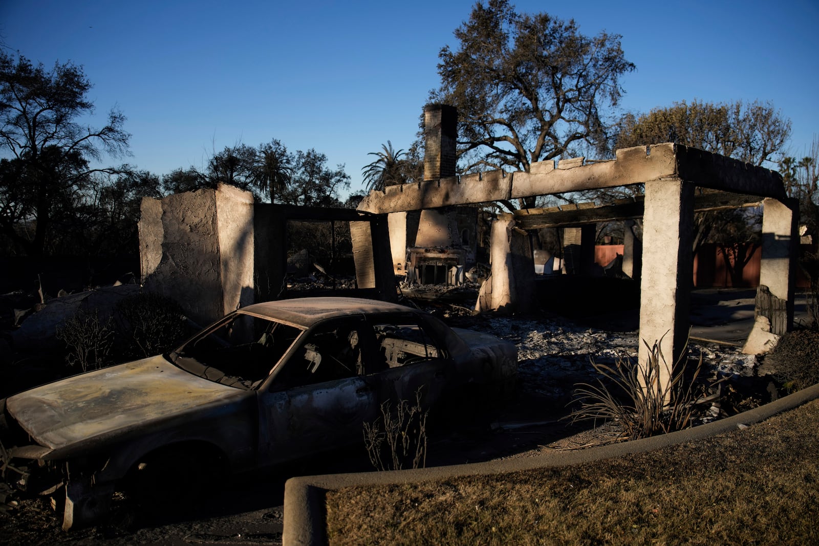 A home destroyed by the Eaton Fire in in Altadena, Calif., is seen Wednesday, Jan. 15, 2025. (AP Photo/John Locher)