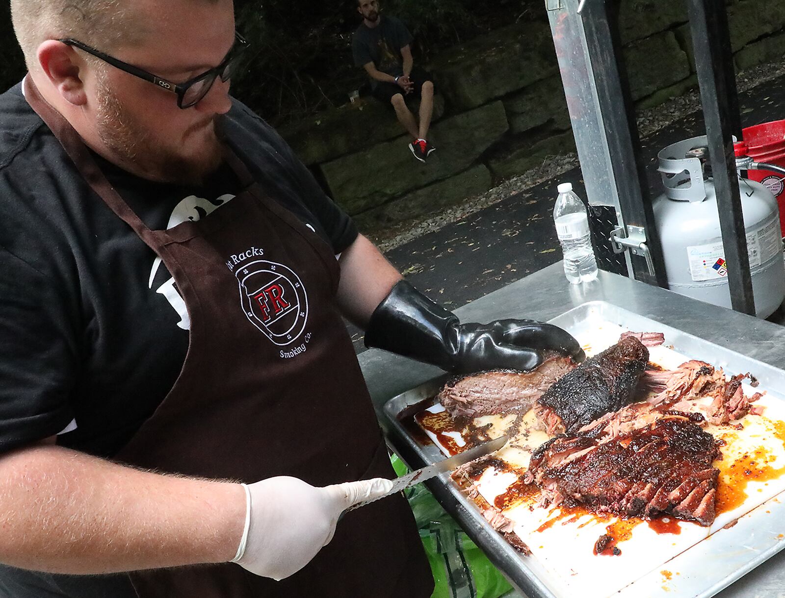 Fat Racks Smoking Co. in South Vienna served up one of its many delights during the 2018 Springfield Rotary Gourmet Food Truck Competition at Veteran’s Park. BILL LACKEY / STAFF