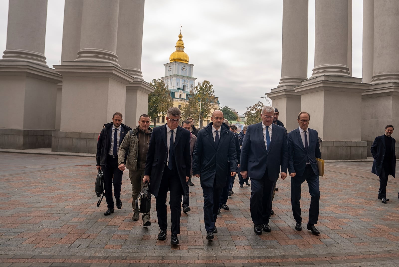 French Foreign Minister Jean-Noel Barrot and Ukrainian Minister of Foreign Affairs Andrii Sybiha walk towards Ministry of Foreign Affairs in central Kyiv, Ukraine, Saturday, Oct. 19, 2024. (AP Photo/Alex Babenko)