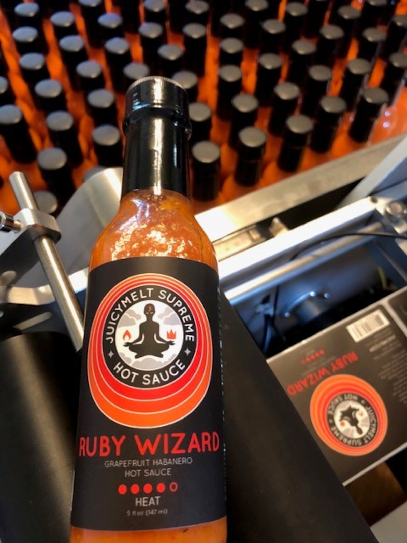 Tracy and Jeffrey McElfresh of Kettering have released JuicyMelt Supreme Hot Sauce.  Varieties include Ruby Wizard (grapefruit habanero), OG Catalyst (orange ginger habanero), and All the Fun (white pepper peach).