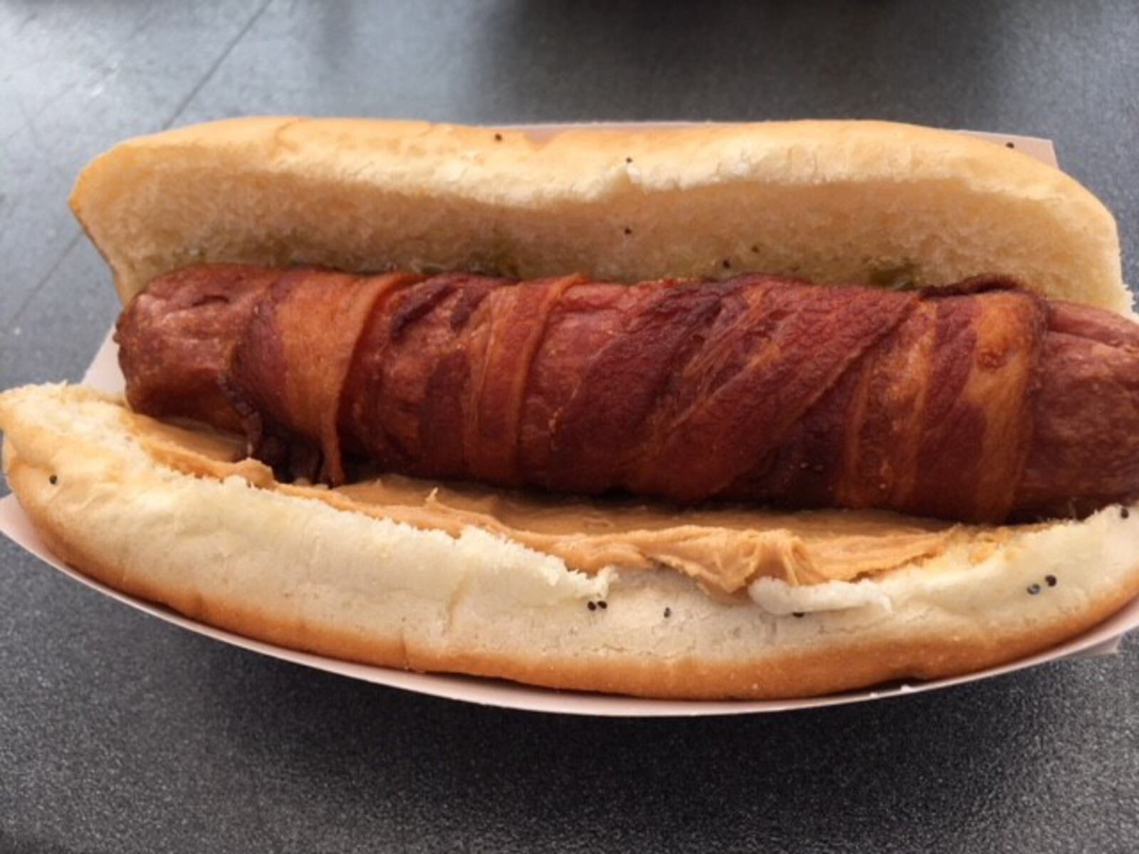 Archers bacon wrapped peanut butter and jelly hotdogs which one most creative use of bacon at BaconFest 2018. ALEXIS LARSEN / CONTRIBUTED