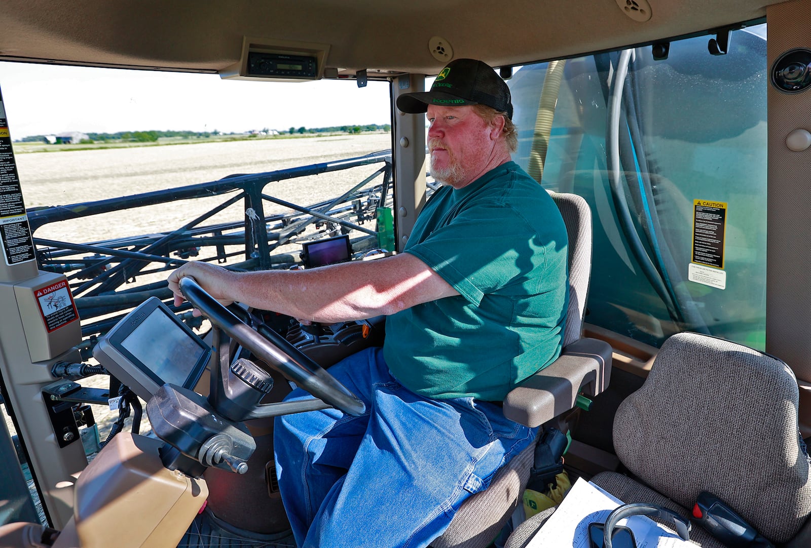 Clark County farmer Brian Harbage gets ready to spray his bean field Friday, June 2, 2023 along Ohio Route 42. BILL LACKEY/STAFF