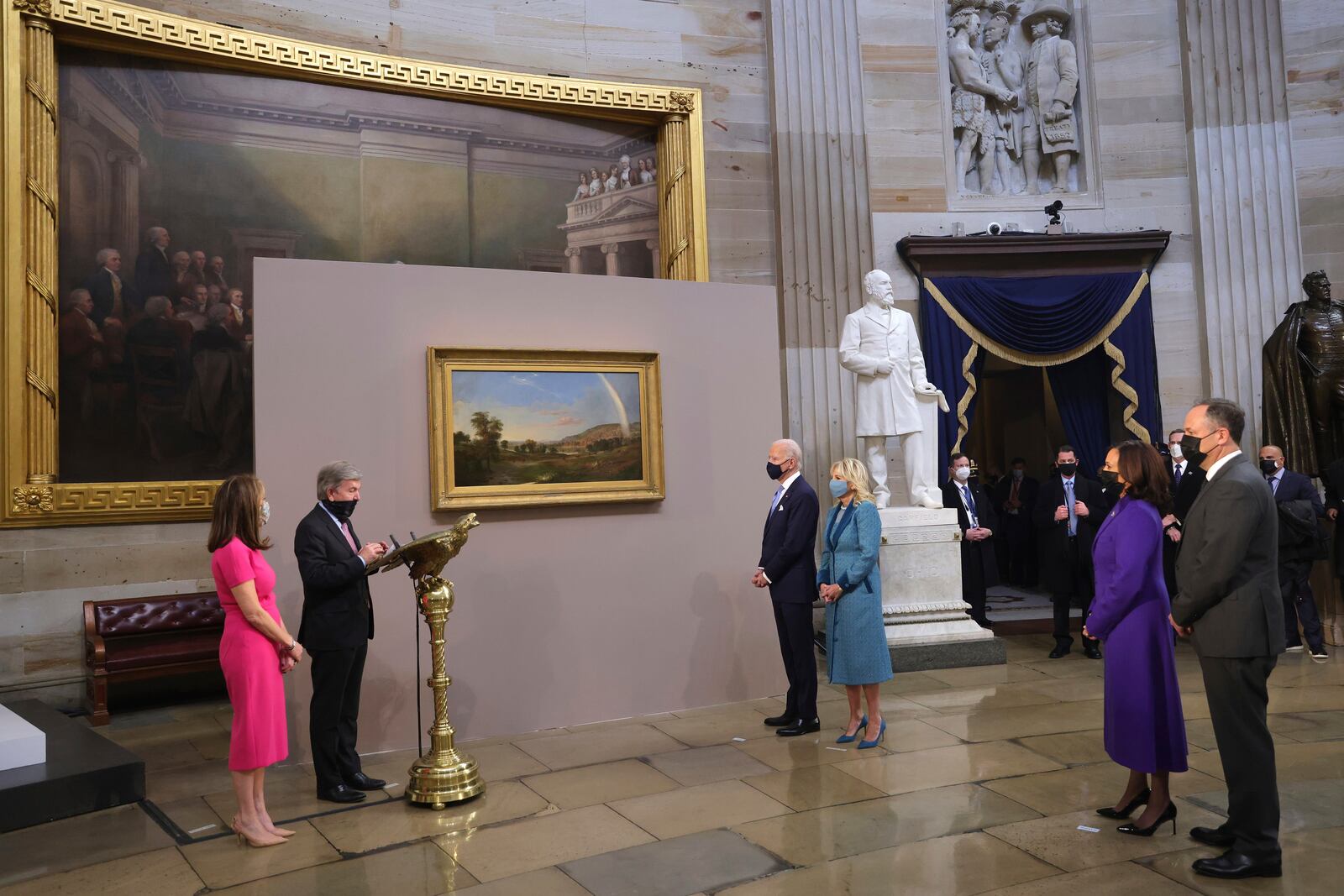 Sen. Roy Blunt, R-Mo, presents a painting to President Joe Biden and first lady Jill Biden, as Vice President Kamala Harris and Doug Emhoff look on at the presentation of gifts ceremony after the 59th Presidential Inauguration at the U.S. Capitol in Washington, Wednesday, Jan. 20, 2021. The painting is by Robert S. Duncanson, a prominent artist in Ohio in the 1800s. (Photo by Win McNamee/Getty Images/Pool Photo via AP)