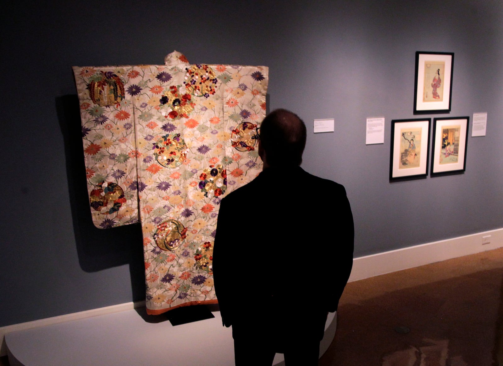 A furisode, a formal style of kimono, is on display in âSamurai, Ghosts and Lovers: Yoshitoshi's Complete 100 Aspects of the Moon,â at the Dayton Art Institute. LISA POWELL / STAFF