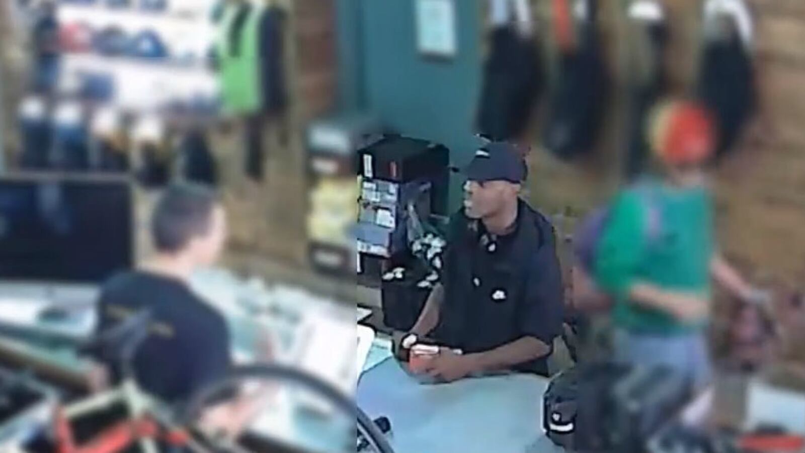 A security camera image from a Chicago bike shop shows a man suspected of shooting a 28-year-old woman in the back Wednesday, Sept. 18, 2019. The man, identified by police as Michael Blackman, is also accused of shooting a police officer Saturday.