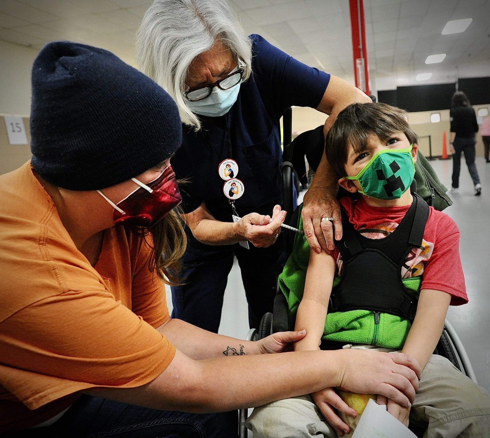 Ezio Hoos, age 5, makes a face while getting his COVID-19 shot in Springfield Thursday Nov. 4, 2021. MARSHALL GORBY\STAFF