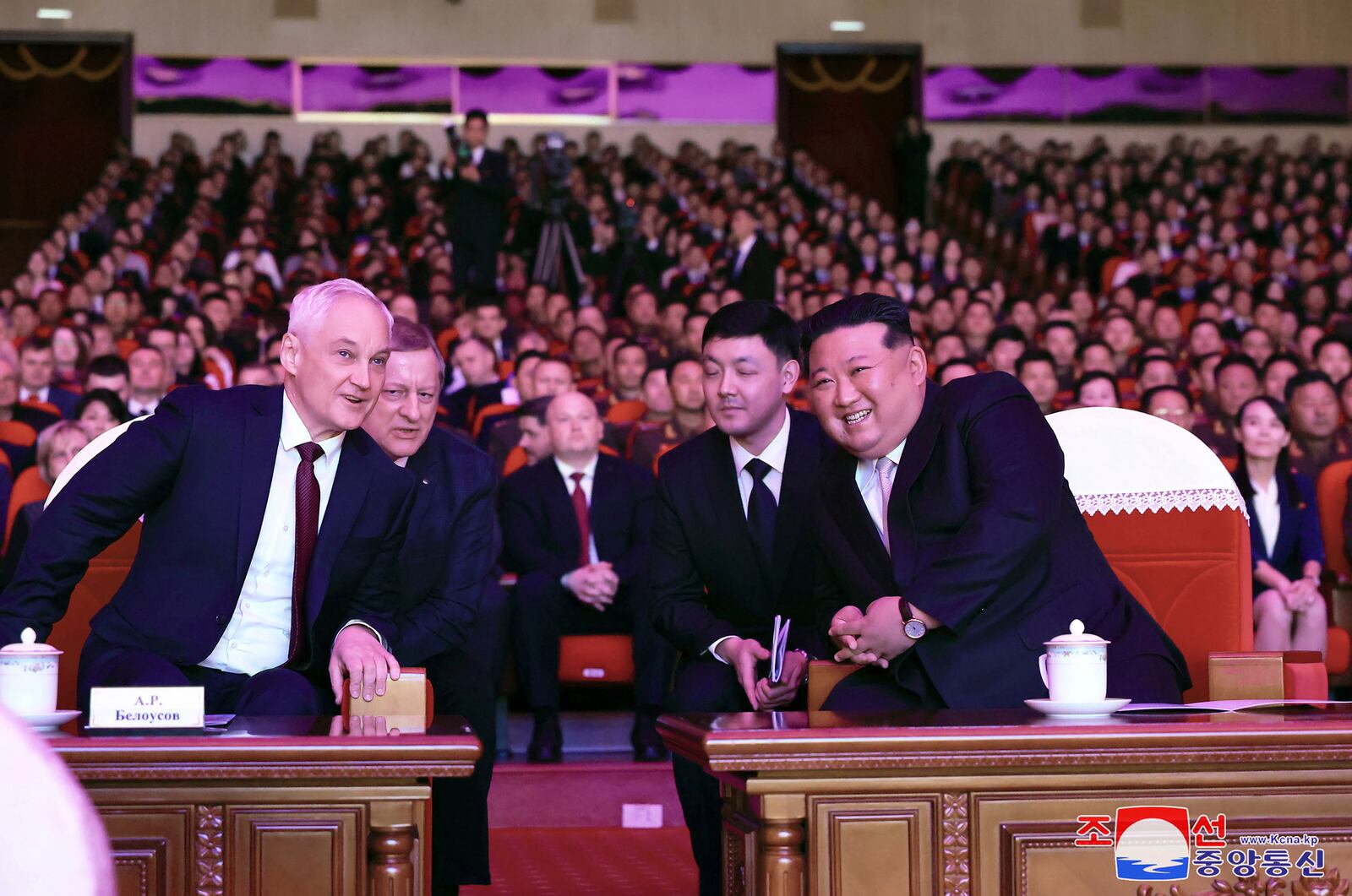 In this photo provided by the North Korean government, North Korean leader Kim Jong Un, right, and Russian Defense Minister Andrei Belousov, left, watch a performance to welcome Russian military delegation in Pyongyang, North Korea Friday, Nov. 29, 2024. Independent journalists were not given access to cover the event depicted in this image distributed by the North Korean government. The content of this image is as provided and cannot be independently verified. Korean language watermark on image as provided by source reads: "KCNA" which is the abbreviation for Korean Central News Agency. (Korean Central News Agency/Korea News Service via AP)