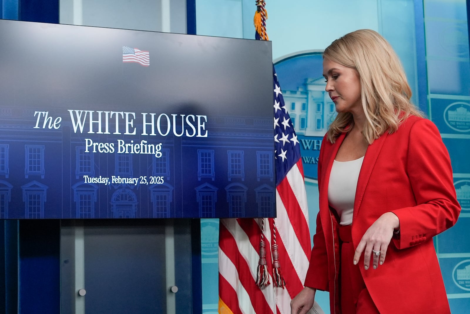 White House press secretary Karoline Leavitt departs the press briefing in the James Brady Press Briefing Room at the White House, Tuesday, Feb. 25, 2025, in Washington. (AP Photo/Alex Brandon)