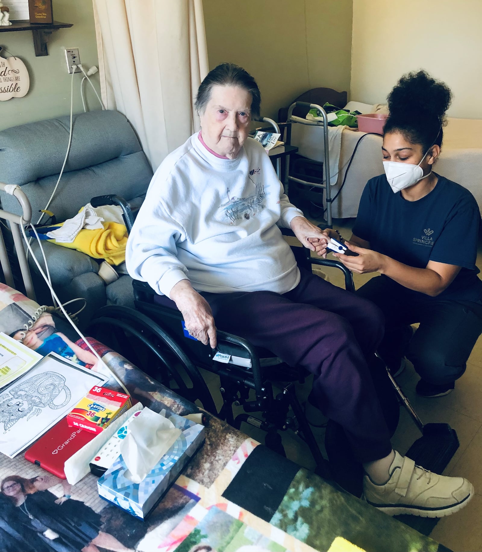 Kaleah Thompson, an STNA at Villa Springfield Rehabilitation and Healthcare Center, treats resident Geraldine Wilson. CONTRIBUTED.