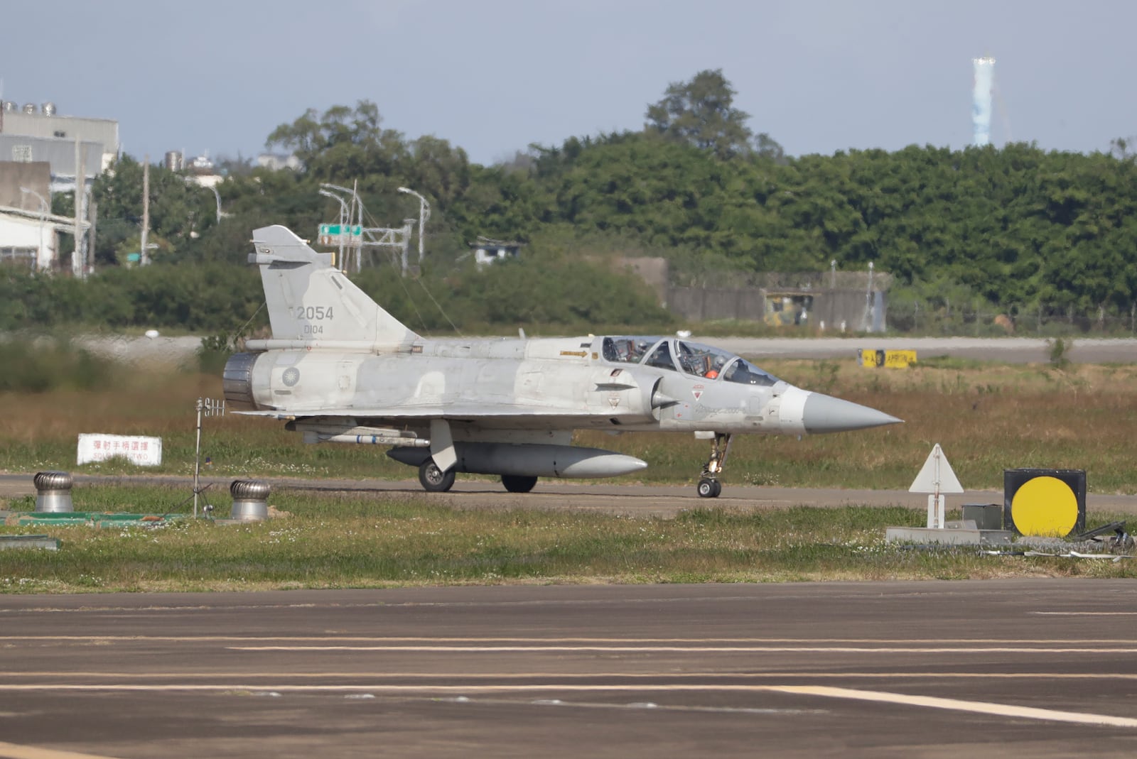 A Taiwan's fighter jet prepares to take off at an airbase in Hsinchu, northern Taiwan, Wednesday, Dec. 11, 2024, as Taiwan's Defense Ministry said it detected Chinese naval ships and military planes engaged in training. (AP Photo/Chiang Ying-ying)