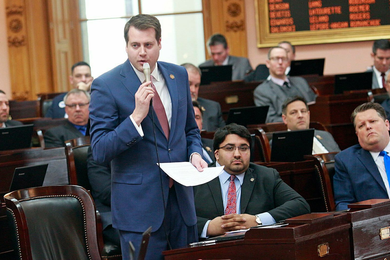 FILE - Ohio State Rep. Derek Merrin, Republican candidate for Ohio's 9th Congressional District, stands while he advocates a yes vote on the Heartbeat Bill at the Ohio Statehouse in Columbus, Ohio, April 10, 2019. (Brooke LaValley/The Columbus Dispatch via AP, File)