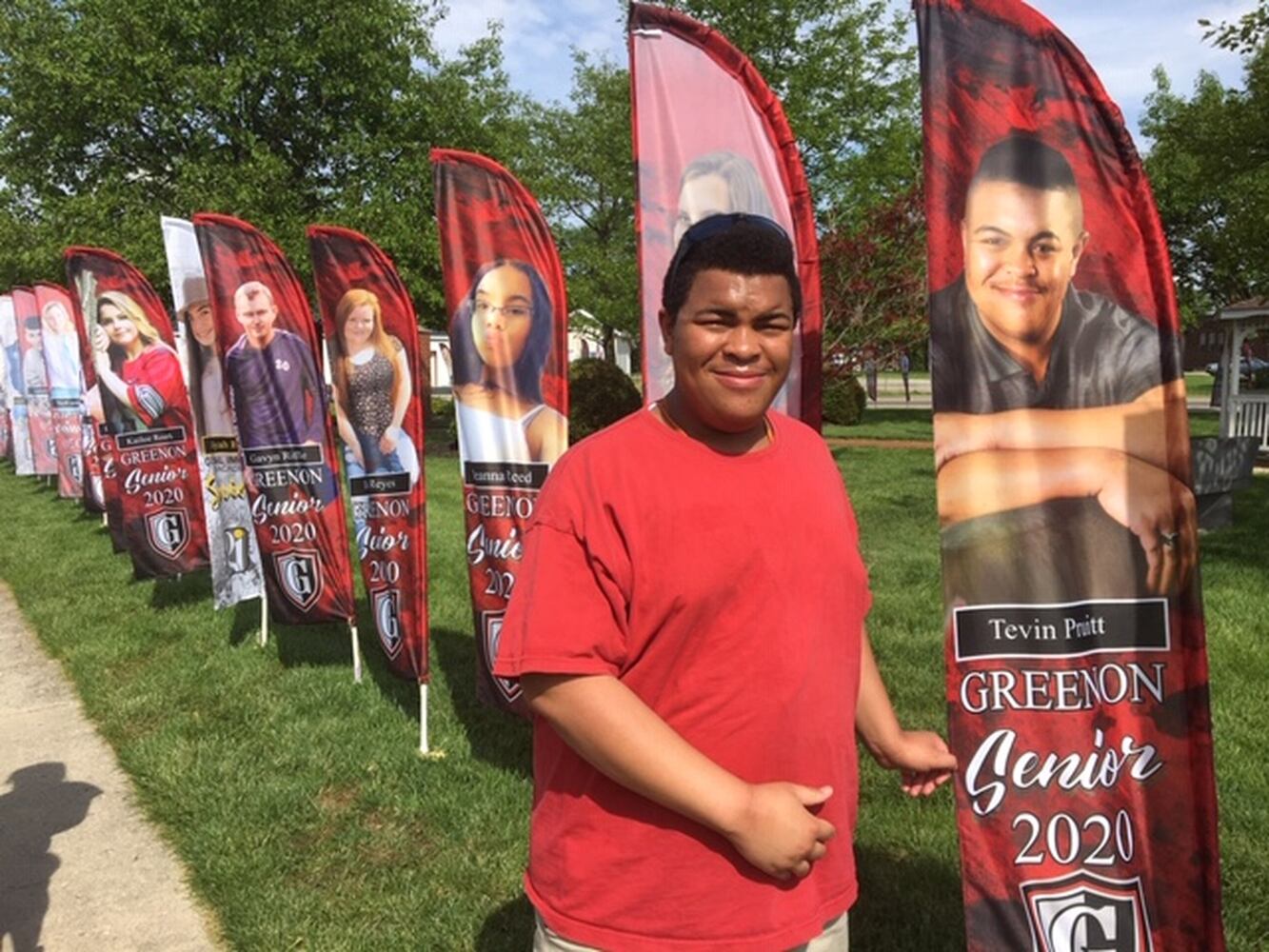 PHOTOS: Enon park features Class of 2020 photo flags to honor graduates