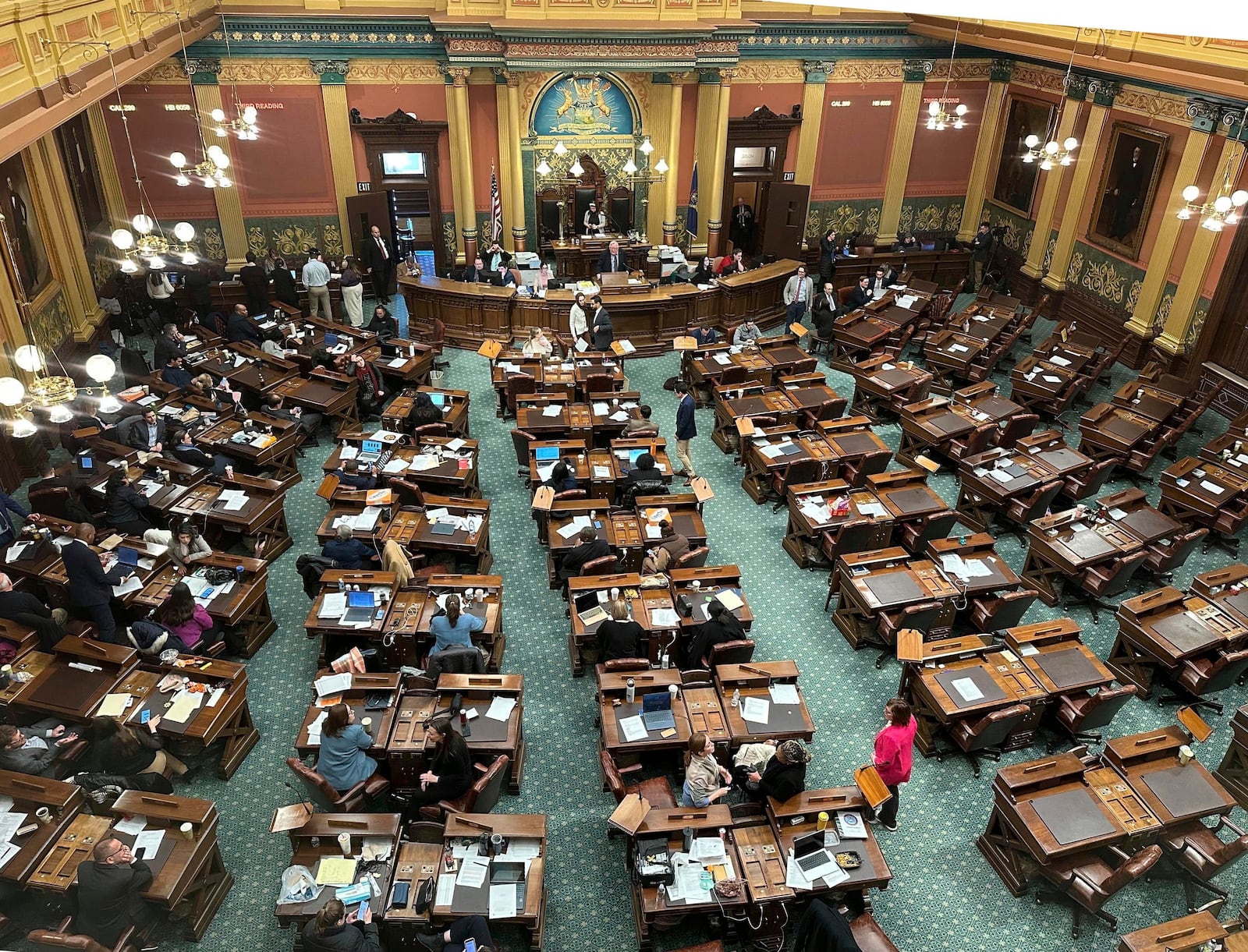 Michigan House of Representative Republicans boycotted the legislative session starting Friday, Dec. 13, 2024, in Lansing, Mich., saying they would not vote on legislation unless it addressed new minimum wage requirements. With a Democratic representative similarly absent this week, the moves ultimately resulted in the Michigan House Democrats ending their business for the year Thursday, Dec. 19, right before Republicans take control of the chamber. (AP Photo/Isabella Volmert)