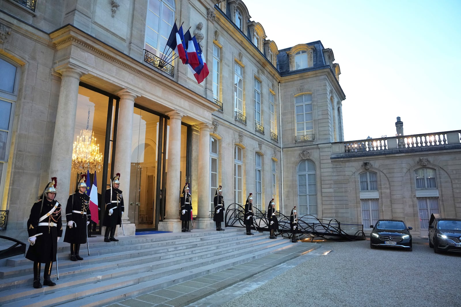 Republican Guards stand outside the Elysee Palace during an informal meeting of leaders from key European Union nations and the United Kingdom in Paris, Monday, Feb. 17, 2025. (AP Photo/Aurelien Morissard)