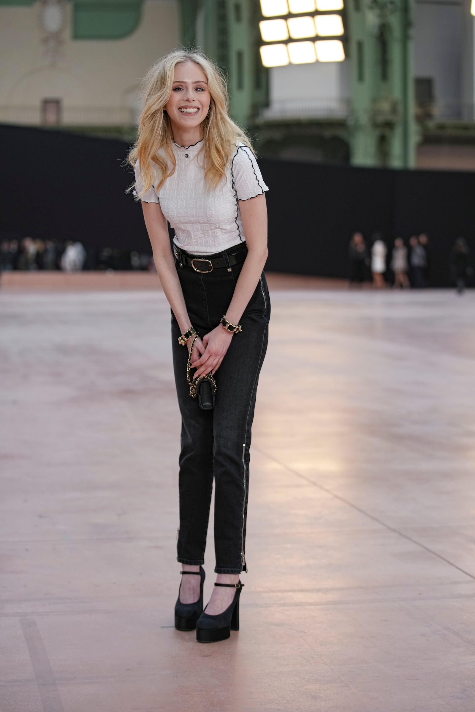 Loreta Peralta arrives for the the Chanel Fall/Winter 2025-2026 Womenswear collection presented Tuesday, March 11, 2025. in Paris. (AP Photo/Christophe Ena).