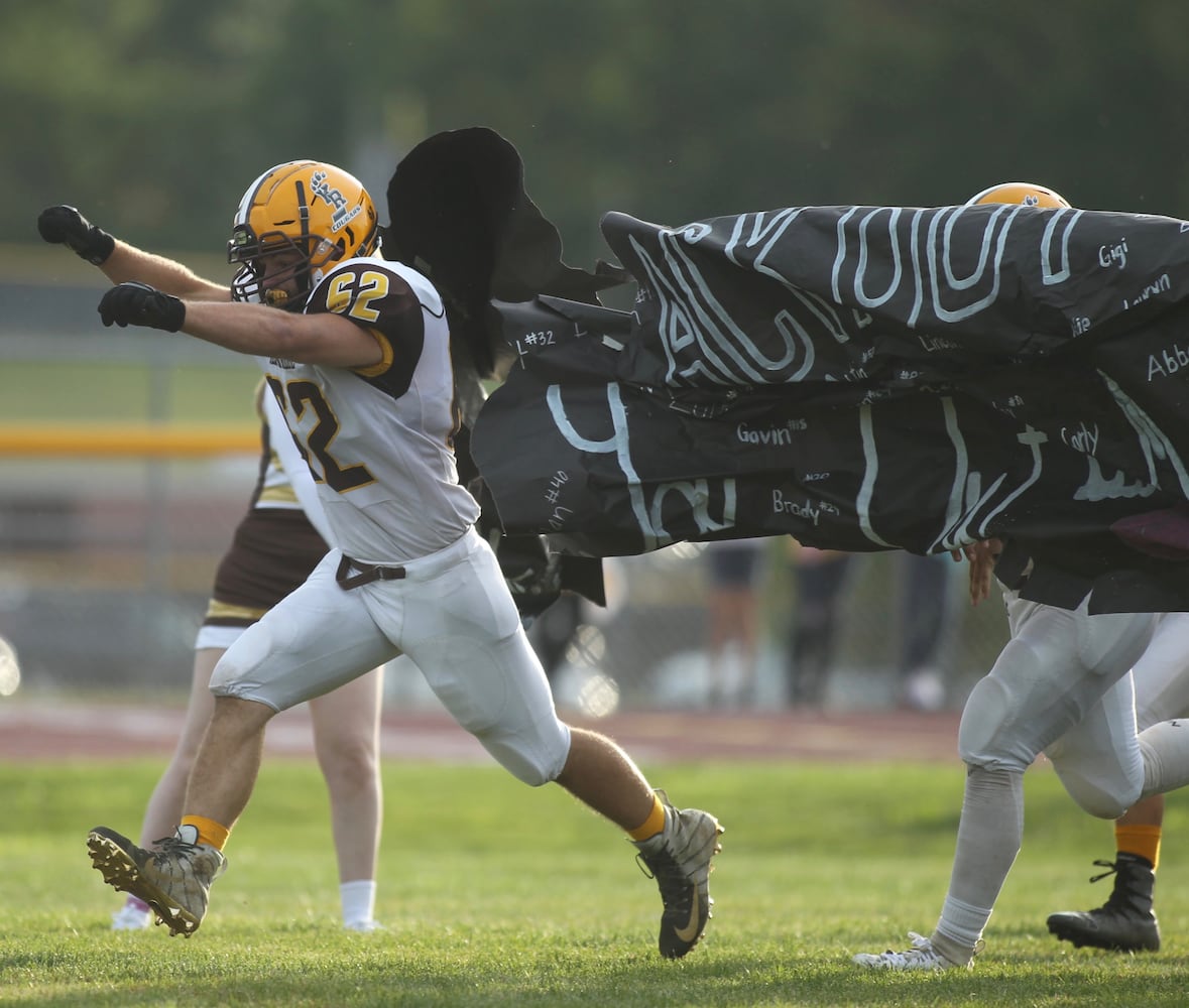 Photos: Mechanicsburg beats Kenton Ridge 27-3 in Week 1