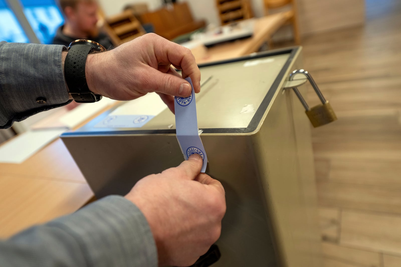 A ballot box is sealed with the electoral seal of the German State of Bavaria in Memmelsdorf, Germany, Sunday, Feb. 23, 2025, during the national election. (Pia Bayer/dpa via AP)