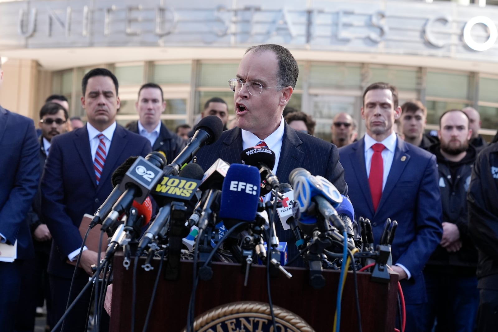 U.S. Attorney John Durham, center front, speaks at a news conference outside the federal courthouse in the Brooklyn borough of New York, Friday, Feb. 28, 2025, following the arraignment of Cartel leaders Rafael Caro Quintero and Vicente Carrillo Fuentes. (AP Photo/Seth Wenig)