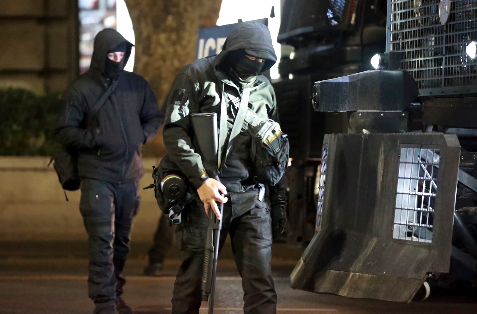 Police officers patrol outside the parliament's building during a protest against the government's decision to suspend negotiations on joining the European Union for four years in Tbilisi, Georgia, Friday, Nov. 29, 2024. (AP Photo/Zurab Tsertsvadze)