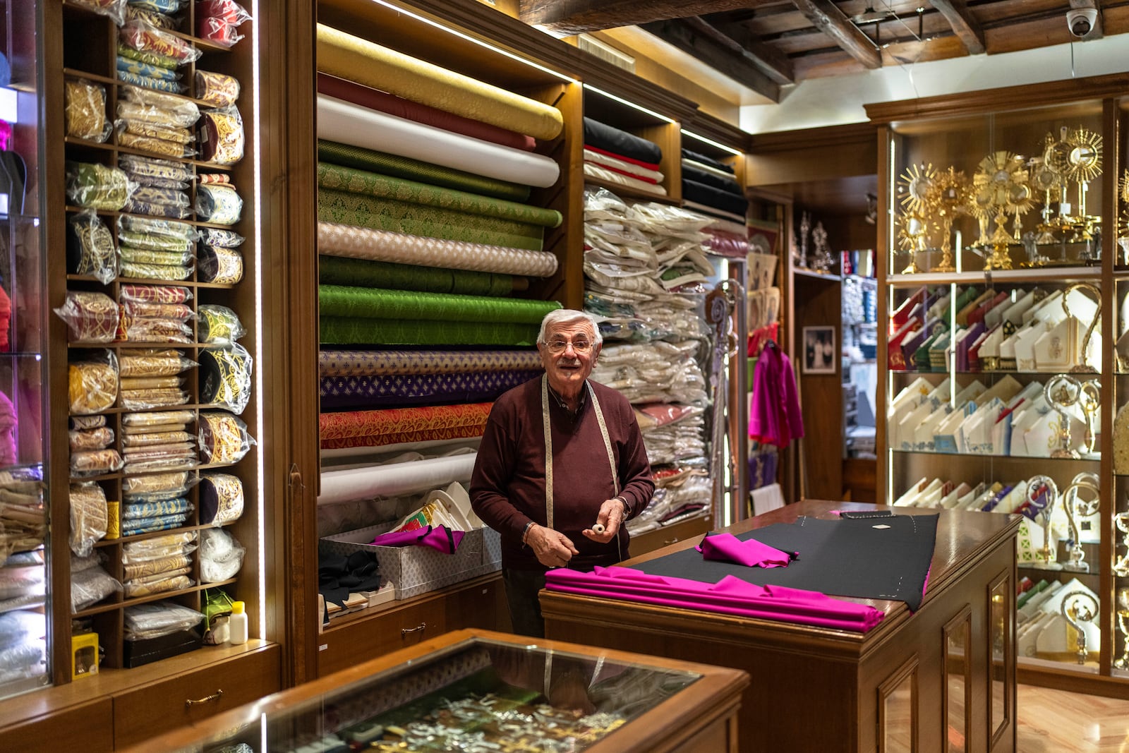 Raniero Mancinelli, a tailor who serves prelates and popes, works in his shop in Rome, Italy, Monday, Feb. 24, 2025. (AP Photo/Mosa'ab Elshamy)