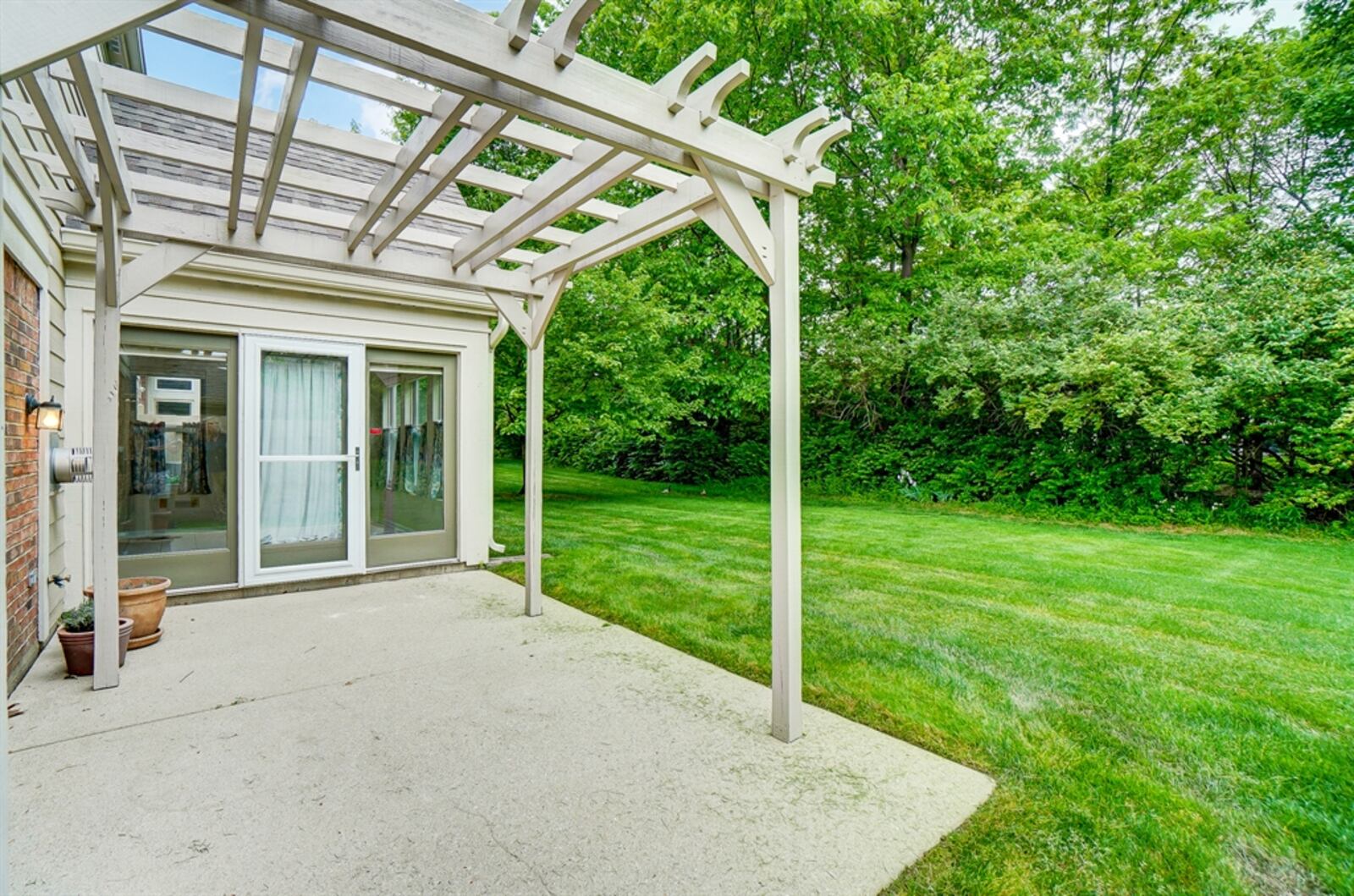 One of a two-unit building, the condo has a private backyard patio. 