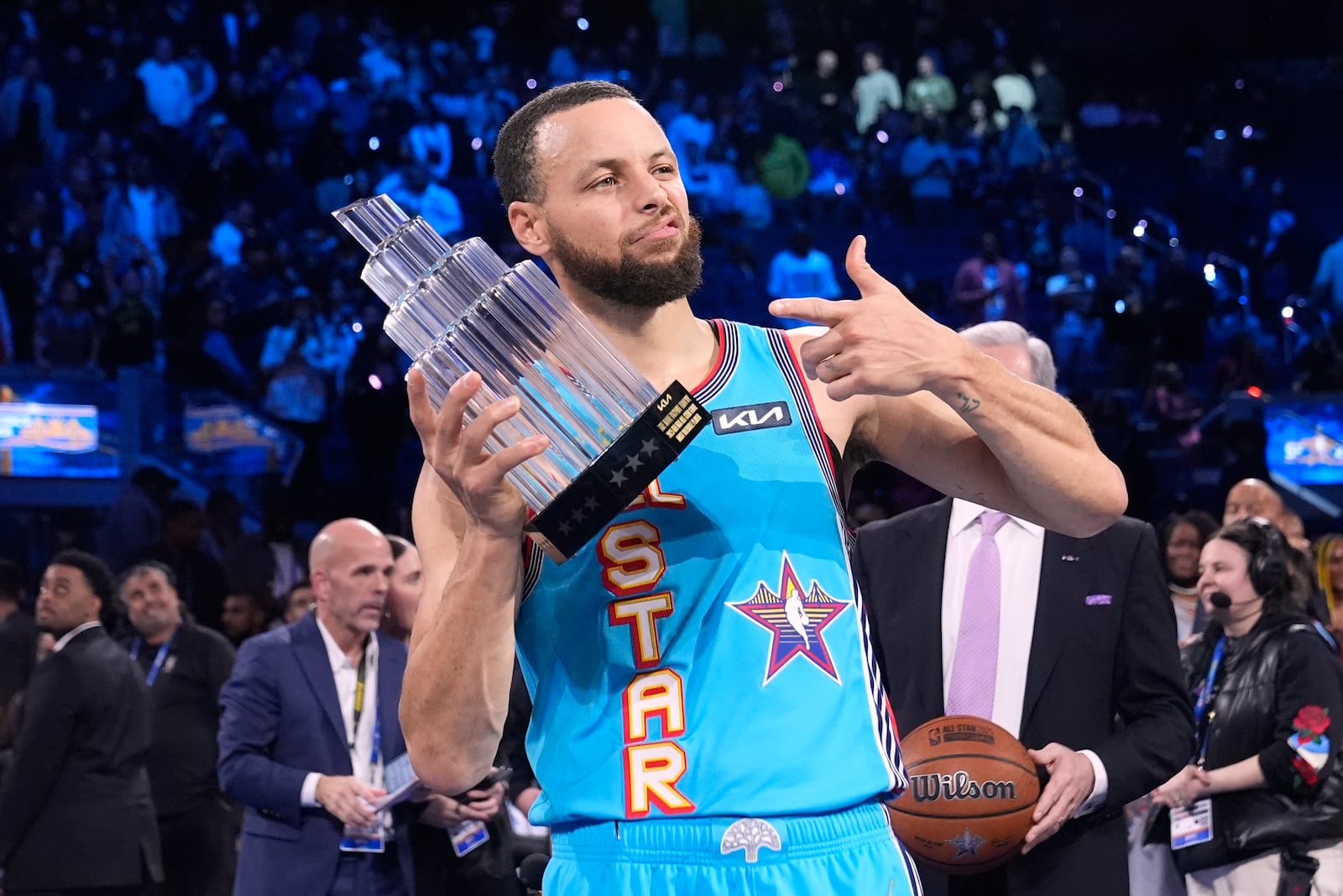 Golden State Warriors guard Stephen Curry holds the Most Valuable Player trophy after the NBA All-Star basketball game Sunday, Feb. 16, 2025, in San Francisco. (AP Photo/Godofredo A. Vásquez)