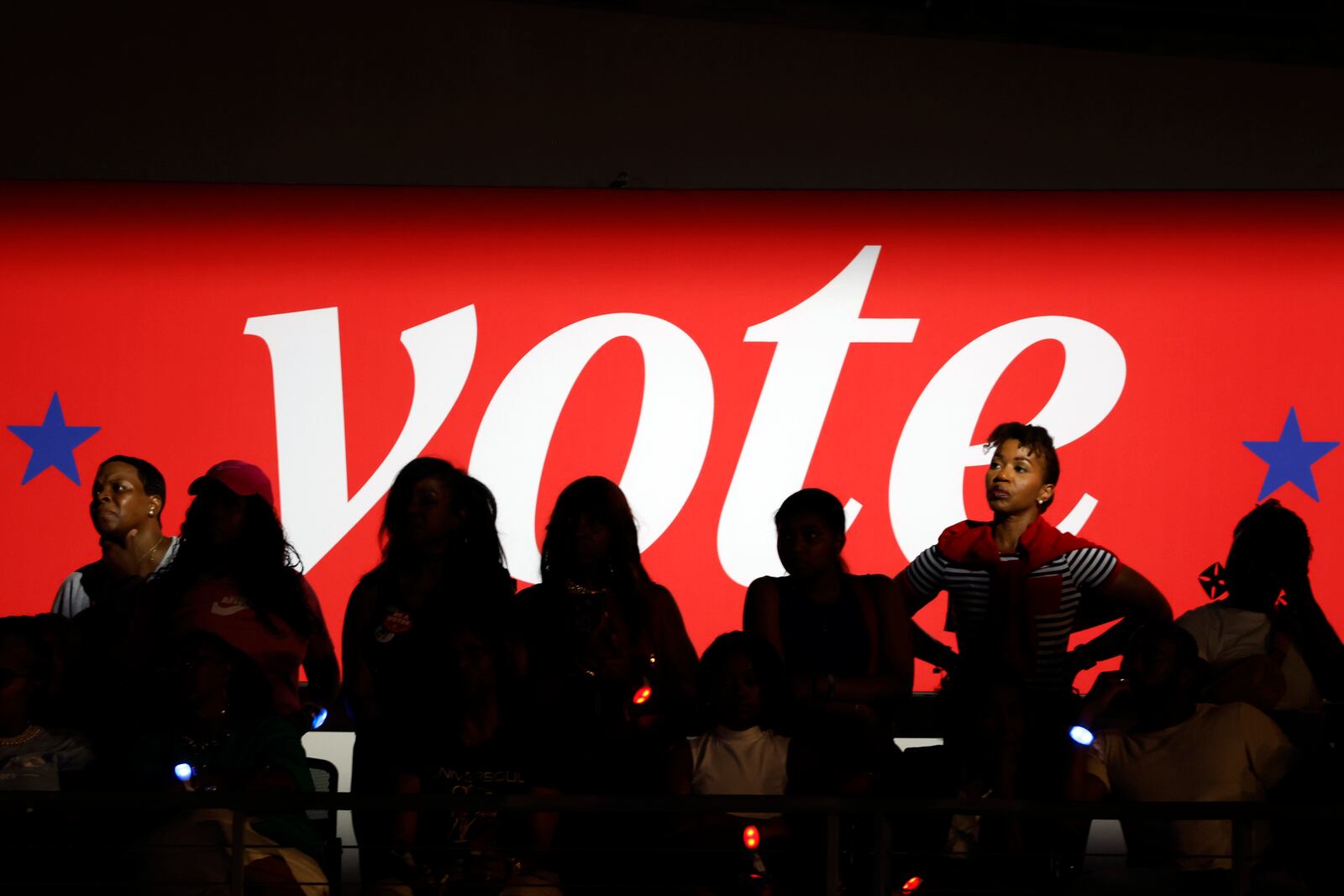 Attendees look on at a campaign rally for Democratic presidential nominee Vice President Kamala Harris, Friday, Oct. 25, 2024, in Houston. (AP Photo/Annie Mulligan)