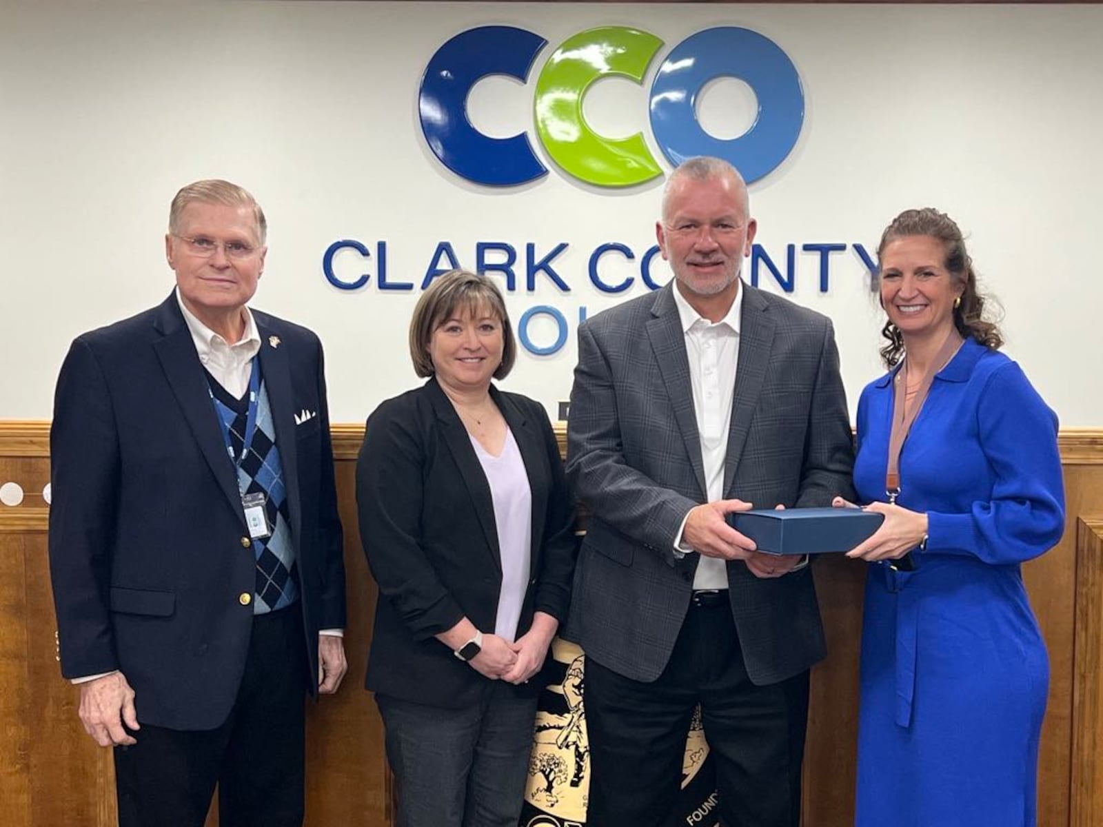 Luminary award recipient John Brown (second from right) poses with Commissioners (from left to right) Lowell McGlothin, Sasha Rittenhouse and Melanie Flax Wilt Friday, Dec. 27, 2024. CONTRIBUTED