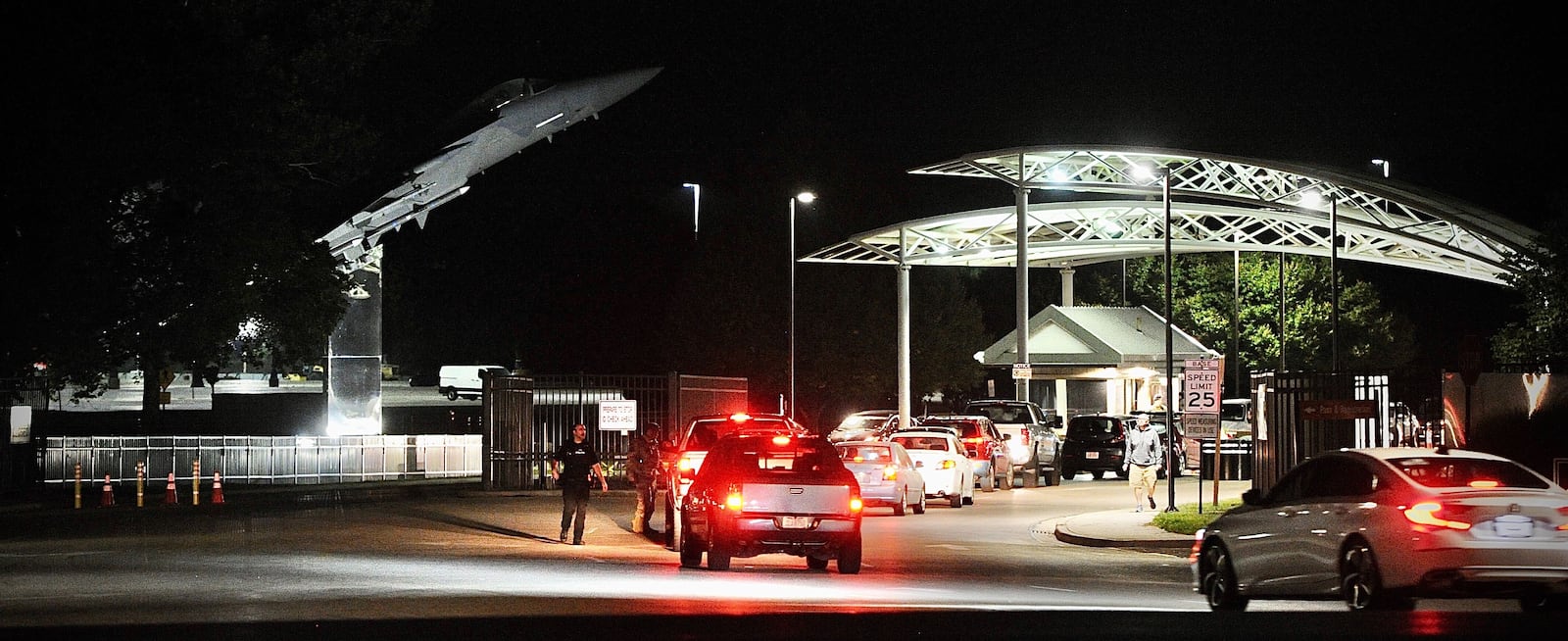 A line of cars are unable to enter through a gate in Area A of Wright-Patterson Air Force Base Sept. 9, 2021, because it is locked down following a report of an active shooter. MARSHALL GORBY\STAFF