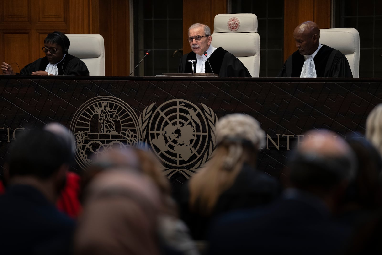 FILE - Presiding Judge Nawaf Salam reads the ruling of the International Court of Justice, or World Court, in The Hague, Netherlands, May 24, 2024, where the top United Nations court ruled on an urgent plea by South Africa for judges to order Israel to halt its military operations in Gaza and withdraw from the enclave. (AP Photo/Peter Dejong, File)