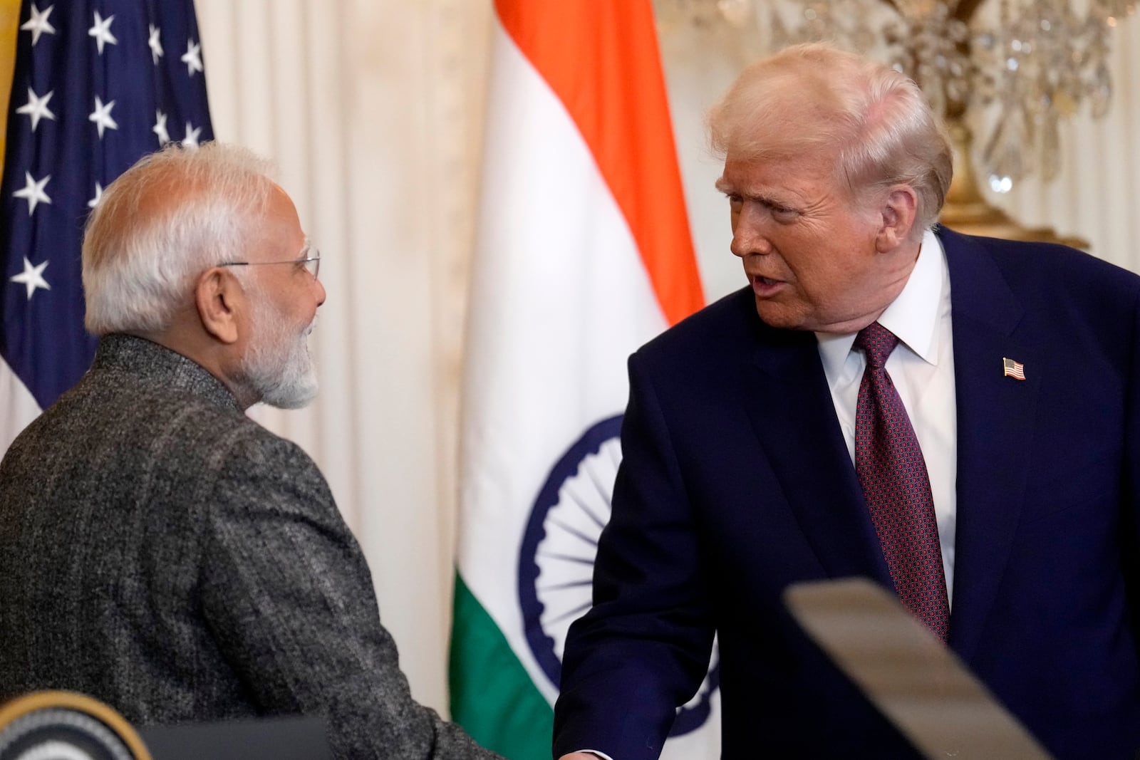 President Donald Trump, right, shakes the hand of India's Prime Minister Narendra Modi at the conclusion of a news conference in the East Room of the White House, Thursday, Feb. 13, 2025, in Washington. (AP Photo/Ben Curtis)