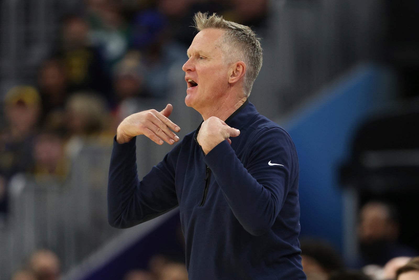 Golden State Warriors head coach Steve Kerr gestures to his team during the first half of an NBA basketball game against the Boston Celtics in San Francisco, Monday, Jan. 20, 2025. (AP Photo/Jed Jacobsohn)