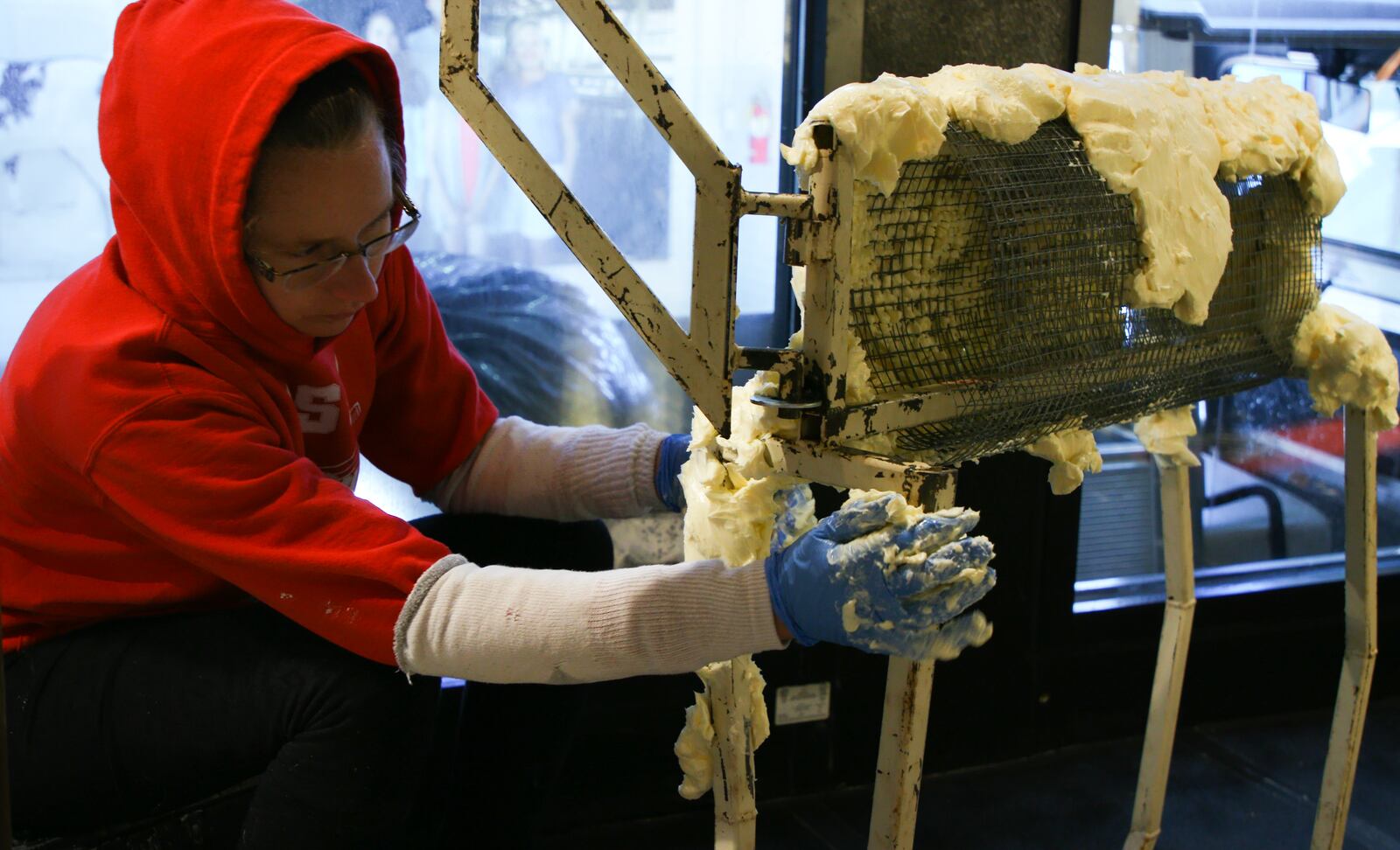 Sculptors first build steel frames to support the butter, then spend hours molding and smoothing while the sculptures take shape. PHOTO: CONTRIBUTED