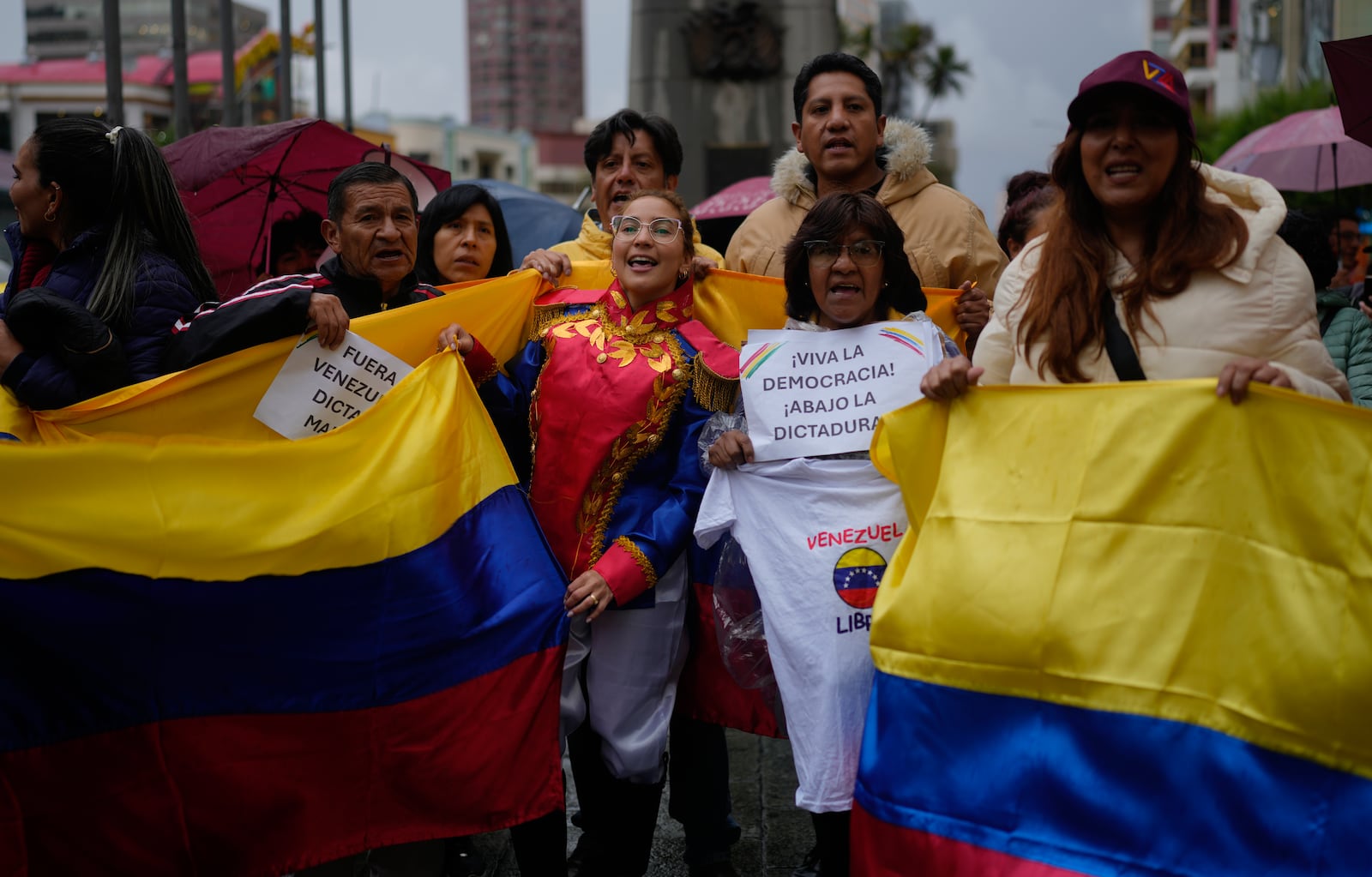 Opponents of Venezuelan President Nicolas Maduro participate in a protest the day before his inauguration for a third term, in La Paz, Bolivia, Thursday, Jan. 9, 2025. (AP Photo/Juan Karita)