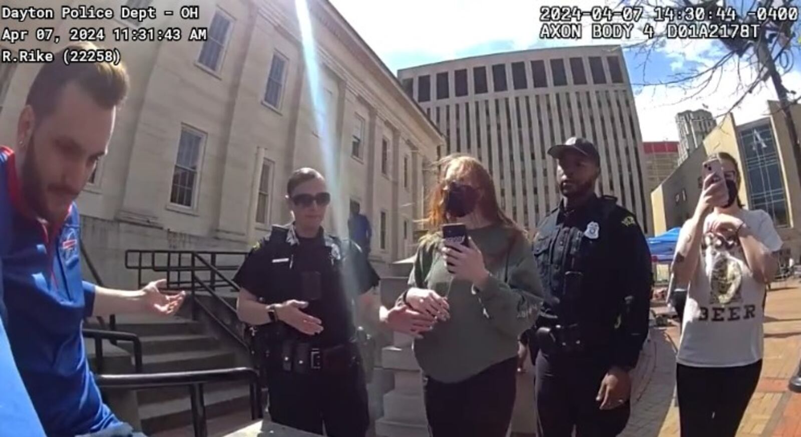 Dayton police arrested a man at Courthouse Square in downtown Dayton on April 7, 2024, for handing out food without a permit. Body camera footage captured the incident. CONTRIBUTED