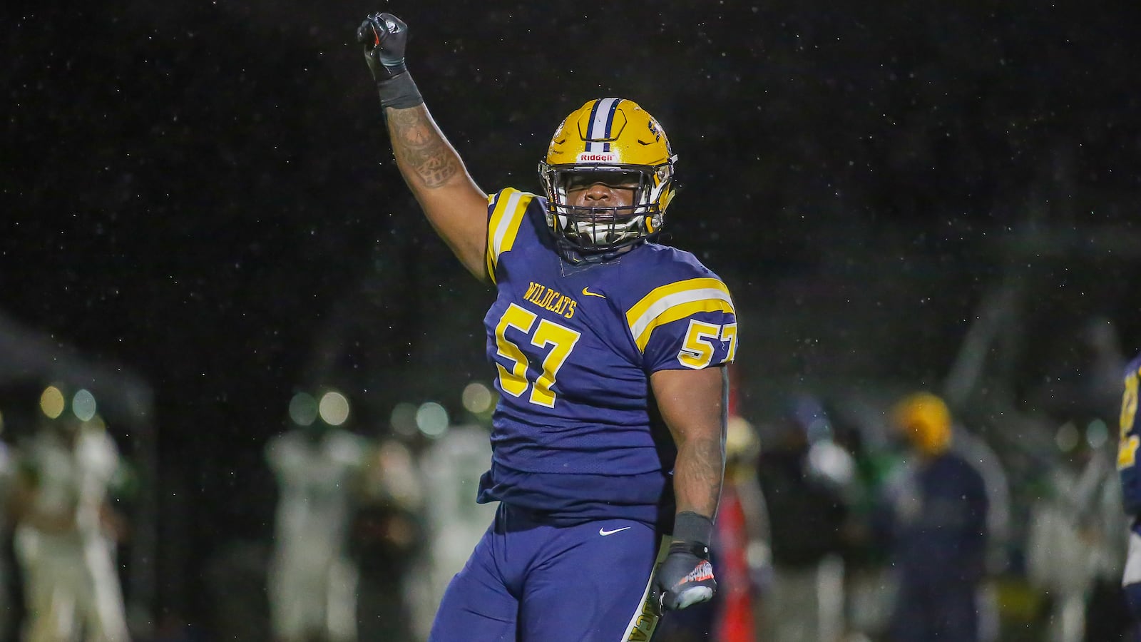 Springfield High School senior Jokell Brown (57) celebrates during their game against Northmont on Friday, Oct. 29 in Springfield. Michael Cooper/CONTRIBUTED