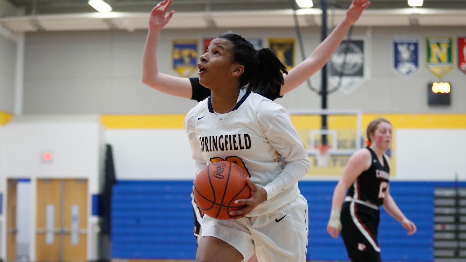 Springfield High School junior Tymarah De'Armond prepares to shoot the ball during their game against Triad last season. Michael Cooper/CONTRIBUTED