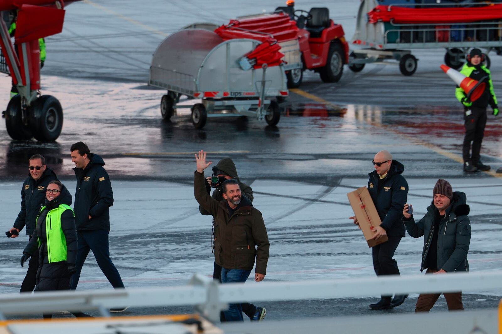 Donald Trump Jr., center, gestures as he arrives in Nuuk, Greenland, Tuesday, Jan. 7, 2025. (Emil Stach/Ritzau Scanpix via AP)