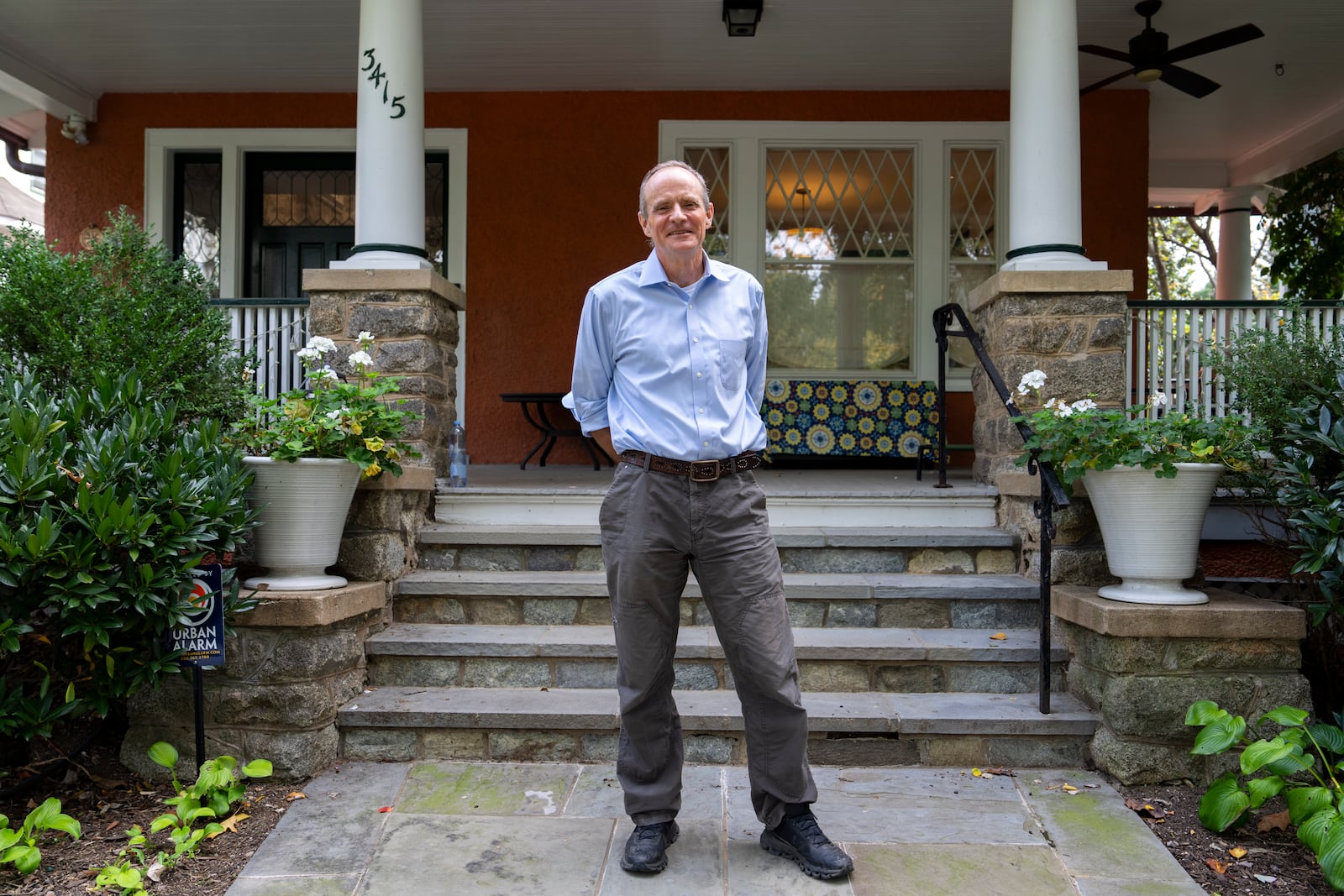 Economist Simon Johnson poses for a photograph after jointly winning the Nobel memorial prize in economics, at his home in Washington, Monday, Oct. 14, 2024. (AP Photo/Ben Curtis)