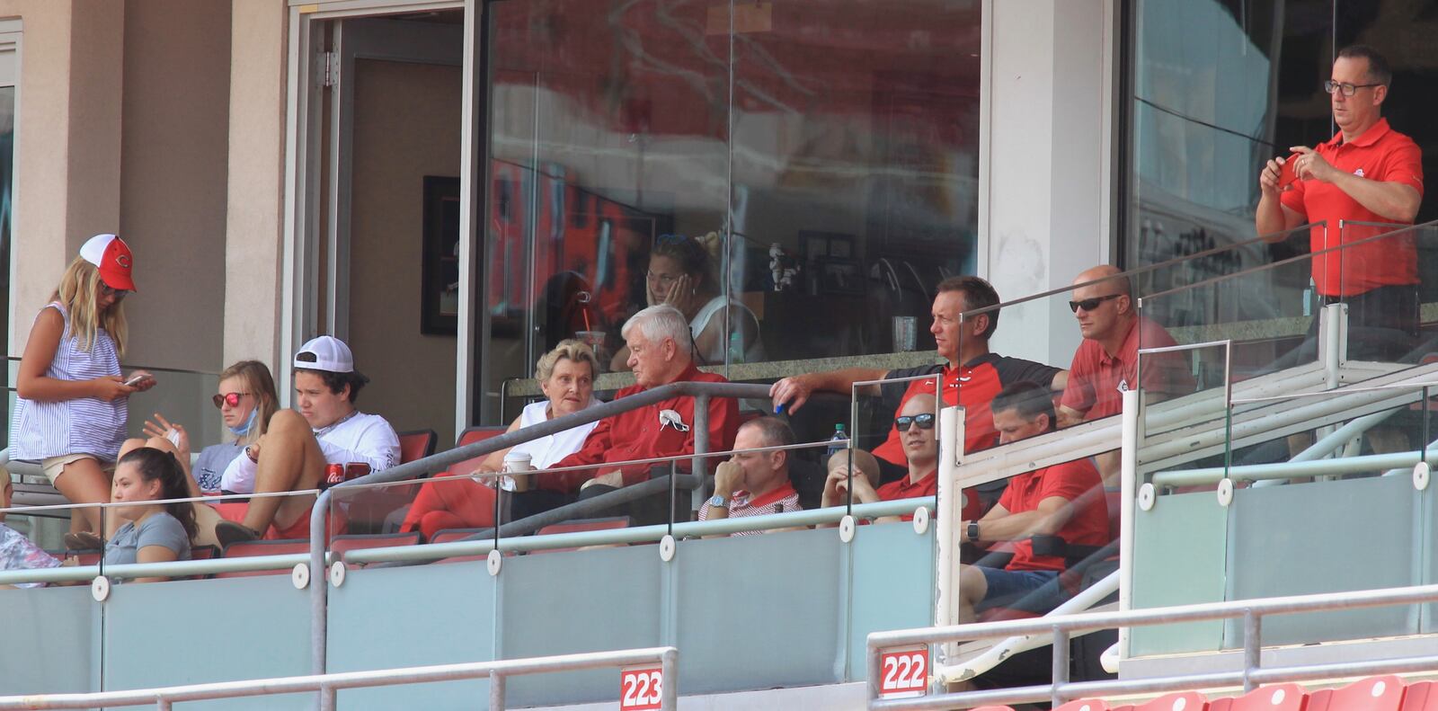 Reds owner Bob Castellini, center, watches a game against the Tigers on Sunday, July 26, 2020, at Great American Ball Park in Cincinnati. David Jablonski/Staff