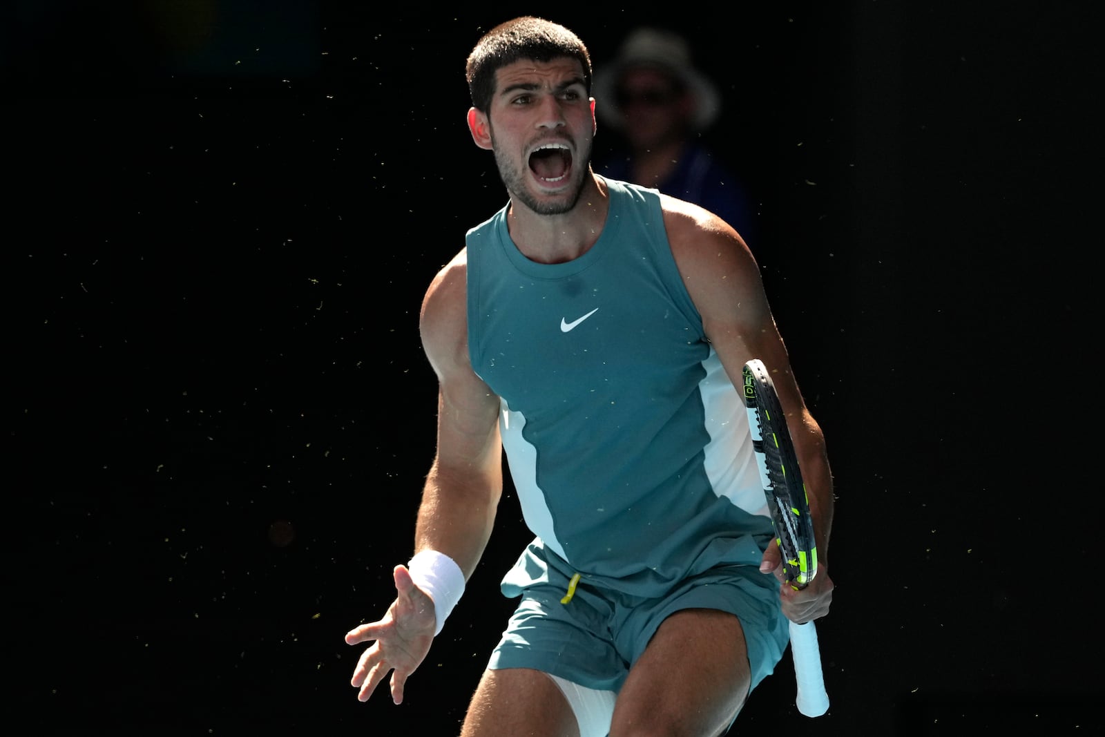 Carlos Alcaraz of Spain reacts during a fourth round match against Jack Draper of Britain at the Australian Open tennis championship in Melbourne, Australia, Sunday, Jan. 19, 2025. (AP Photo/Mark Baker)