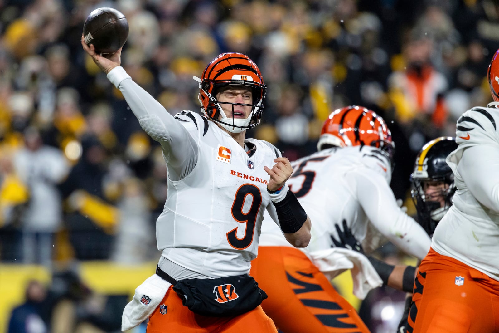 FILE - Cincinnati Bengals quarterback Joe Burrow (9) throws a pass during an NFL football game, Saturday, Jan. 4, 2025, in Pittsburgh. (AP Photo/Matt Durisko, File)