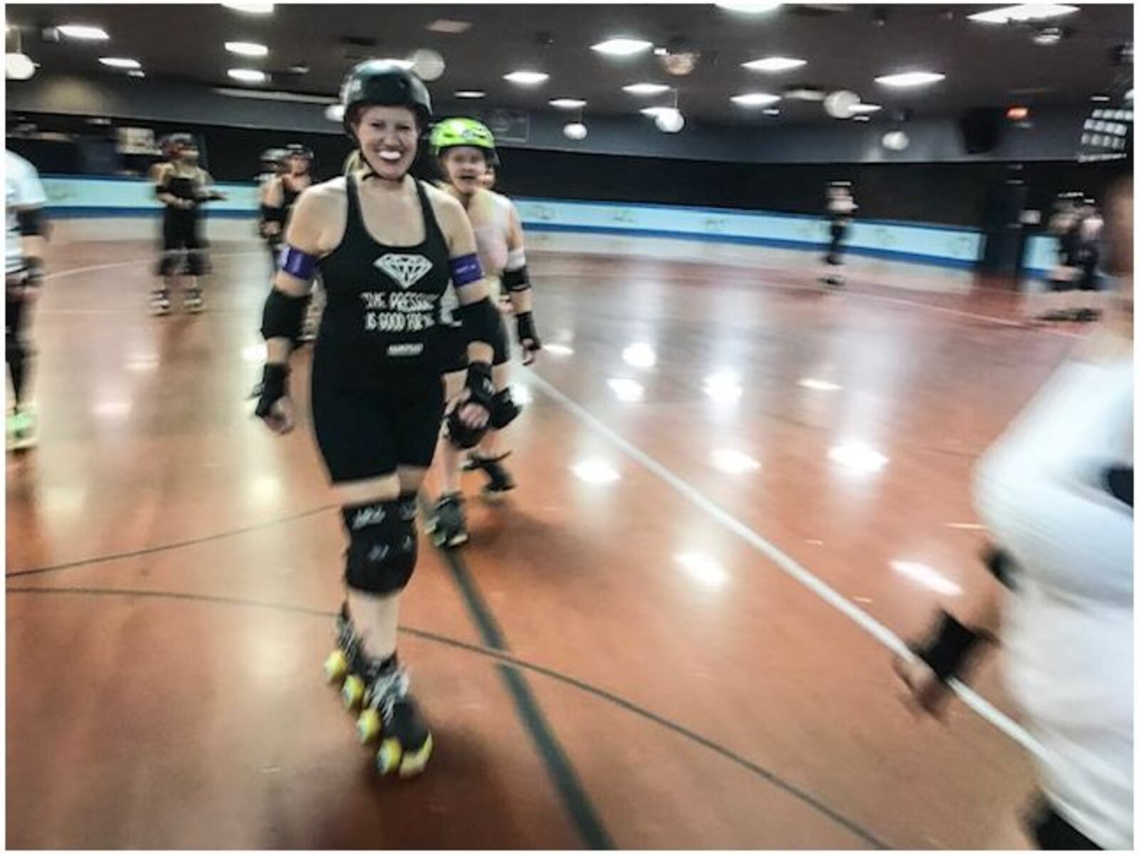 SuperSonic (also known as Cristen Bonner) said the Gem City Roller Girls Purple Reign wants to give back to the community. (Jim Noelker/Staff)