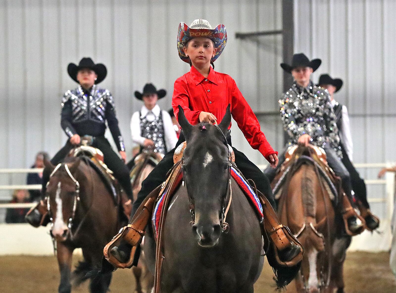 Riders compete in one of the classes at the Tough Enough to Wear Pink horse show Thursday at the Champions Center in 2021. BILL LACKEY/STAFF