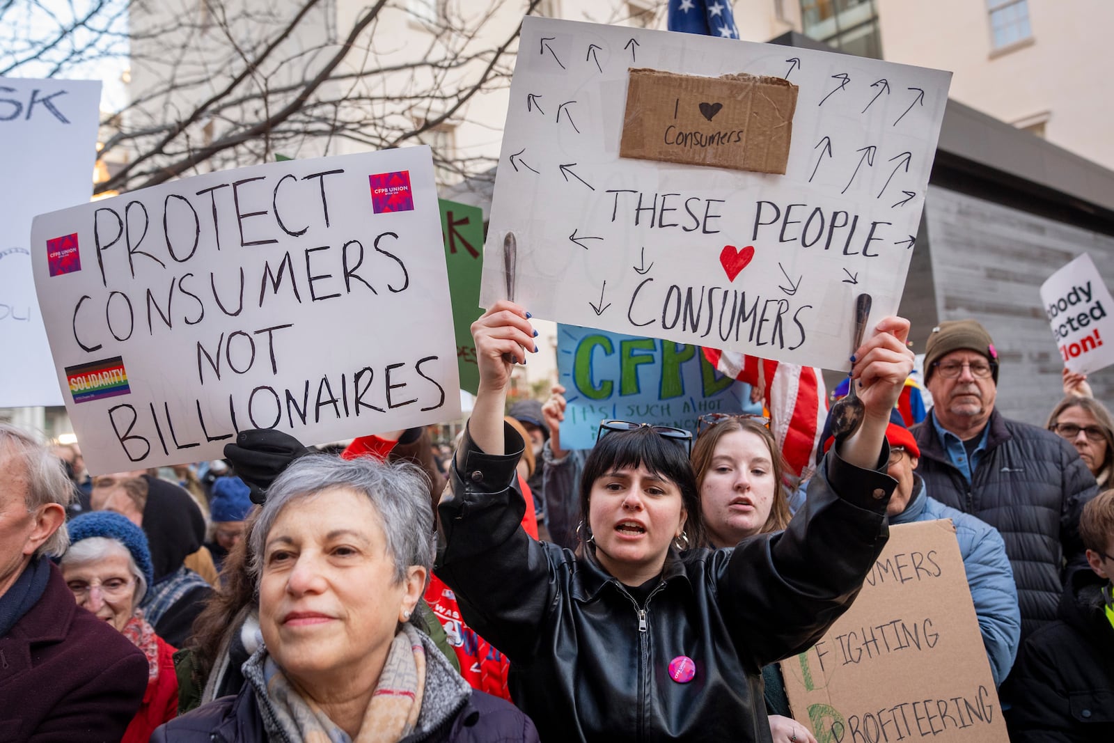 People attend a protest in support of the Consumer Financial Protection Bureau (CFPB) headquarters, Monday, Feb. 10, 2025, at the CFPB in Washington. (AP Photo/Jacquelyn Martin)